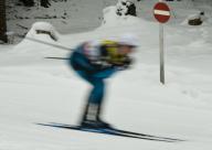 A skier passing a one way sign during the FIS cross country World Cup in Davos, on December 10th, 2017. Photo: Gunter Schiffmann/GASPA