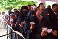 GHAZIABAD, INDIA - APRIL 26: People are queuing up outside a polling station during the Second phase of the general Loksabha elections at a polling booth in Masuri on April 26, 2024 in Ghaziabad, India. (Photo by Sakib Ali\/Hindustan Times