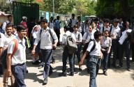 NEW DELHI, INDIA - MAY 2: School students leave after multiple bomb threats received in Delhi-NCR schools, at Bharitya Vidya bhawan School CP, on May 2, 2024 in New Delhi, India. Early Wednesday early morning, educational institutions across Delhi-NCR received emails threatening that a bomb has been placed in the campus premises. This turned out to be a hoax, but triggered panic among parents and students. Many schools sent messages early in the morning to parents not to send their wards to school while others suspended classes and urged parents to pick their wards from the school. (Photo by Sonu Mehta\/Hindustan Times