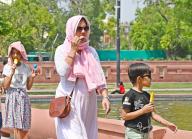 NEW DELHI, INDIA - MAY 5: Visitors out on a hot sunny day at India Gate, in New Delhi, on May 5, 2024 in New Delhi, India. As temperature is rise in Delhi NCR. (Photo by Sanjeev Verma\/Hindustan Times