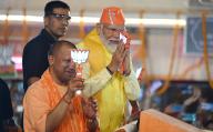 LUCKNOW, INDIA - MAY 5: Prime Minister Narendra Modi during the road show in Ayodhya in a support of BJP candidate Lallu Singh from Faizabad (Ayodhya) parliamentary seat, UP CM Yogi Adityanath also present in road show at Rampath, on May 5, 2024 in Lucknow, India. (Photo by Deepak Gupta/Hindustan Times 