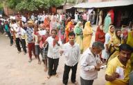 KHAGARIA, INDIA - MAY 7: Voters in queue for cast votes during 3rd phase of Lok Sabha election at a polling booth on May 7, 2024 in Khagaria, India. (Photo by Santosh Kumar\/Hindustan Times