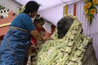 KOLKATA, INDIA - MAY 8: A kid pays floral tribute to Nobel laureate Rabindranath Tagore at Jorasanko Thakurbari, the ancestral house of Tagore, on the occasion of his 163rd birth anniversary on May 8, 2004 in Kolkata, India. (Photo by Samir Jana\/Hindustan Times