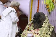 KOLKATA, INDIA - MAY 8: Left Front chairman Biman Bose pays floral tribute to Nobel laureate Rabindranath Tagore at Jorasanko Thakurbari, the ancestral house of Tagore, on the occasion of his 163rd birth anniversary on May 8, 2004 in Kolkata, India. (Photo by Samir Jana\/Hindustan Times