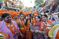 NEW DELHI, INDIA - MAY 8: Artists dressed as lord Ram Sita campaign for BJP candidate from East Delhi Lok Sabha Seat Harsh Malhotra at a Road show, in Kalyanpuri, on May 8, 2024 in New Delhi, India. (Photo by Sanjeev Verma\/Hindustan Times