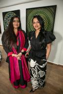 NEW DELHI, INDIA - MAY 4: (L-R) Nupur Kundu with Aanchal Garg during an art show exhibition of Ghanshyam Gupta, titled âHappy Vibrationsâ, featured non-figurative paintings that aimed to evoke positive emotion and promote well-being through color therapy, on May 4, 2024 in New Delhi, India. (Photo by Raajessh Kashyap\/Hindustan Times