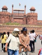 NEW DELHI, INDIA - MAY 19: Visitors at Red Fort seen with their heads covered to protect them from the hot summer day , on May 18, 2024 in New Delhi, India. It was very hot in the city on Saturday. The maximum temperature was around 46 degrees Celsius and the minimum temperature was around 32 degrees Celsius. (Photo by Arvind Yadav/Hindustan Times 