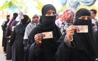 LUCKNOW, INDIA - MAY 20: Burqa-clad voters standing in queue to cast their votes at Hussainabad polling station during the fifth phase of Lok Sabha Election on May 20, 2024 in Lucknow, India. According to the Election Commission of India, 57.57 per cent turnout was recorded in 49 seats in the fifth phase of polling on May 20. (Photo by Deepak Gupta/Hindustan Times