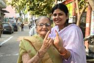 LUCKNOW, INDIA - MAY 20: A woman voter with her grandmother showÂ their inked fingers after casting their vote at Bastauli Primary school polling station during the fifth phase of the Lok Sabha Election on May 20, 2024 in Lucknow, India. According to the Election Commission of India, 57.57 per cent turnout was recorded in 49 seats in the fifth phase of polling on May 20. (Photo by Deepak Gupta/Hindustan Times