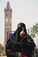 LUCKNOW, INDIA - MAY 20: Burqa-clad voters show her inked fingers after casting her vote at Hussainabad polling station during the fifth phase of Lok Sabha Election on May 20, 2024 in Lucknow, India. According to the Election Commission of India, 57.57 per cent turnout was recorded in 49 seats in the fifth phase of polling on May 20. (Photo by Mushtaq Ali/Hindustan Times