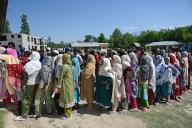 BANDIPORA, INDIA - MAY 20: People stand in queue to cast their votes outside a polling booth during the fifth phase of the Lok Sabha elections in Sumbal area of Bandipora district, north of Srinagar,on 20 May 2024.(Photo By Waseem Andrabi/Hindustan Times