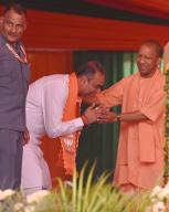 CHANDIGARH, INDIA - MAY 20: BJP Chandigarh Candidate for Lok sabha Sanjay Tandon taking blessings from Uttar Pradesh Chief Minister Yogi Adityanath during an election campaign public meeting at village Maloya on May 20, 2024 in Chandigarh, India. (Photo by Ravi Kumar/Hindustan Times