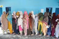 GURUGRAM, INDIA - MAY 25: Voters wait outside a polling booth to cast their votes during the sixth phase of Lok Sabha elections in Mewat, Ghasera village, on May 25, 2024 in Gurugram, India. Polling for the sixth phase of general elections concluded in 58 constituencies across six states and two Union territories, including all seven seats in Delhi. Voter turnout across six states and two Union Territories during Phase 6 polling has been recorded at approximately 58.84 per cent, according to the Voter Turnout App of the Election Commission. (Photo by Parveen Kumar\/Hindustan Times