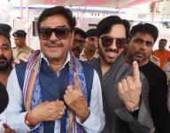 PATNA, INDIA - JUNE 1: TMC leader Shatrughan Sinha with his son Love Sinha showing finger ink marks after cast vote during seventh and last phase of Lok Sabha election at St. Severin\'s School on June 1, 2024 in Patna, India. (Photo by Santosh Kumar\/Hindustan Times