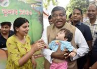 PATNA, INDIA - JUNE 1: BJP candidate from Patna Saheb constituency Ravishankar Prasad playing with a child after cast vote during seventh and last phase of Lok Sabha election at Patna Women\'s College on June 1, 2024 in Patna, India. (Photo by Santosh Kumar\/Hindustan Times