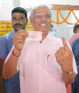 PATNA, INDIA - JUNE 1: Bihar Governor Rajendra Vishanath Arlekar showing finger ink mark and Voter ID Card after cast his vote during seventh and last phase of Lok Sabha election near Raj Bhawan on June 1, 2024 in Patna, India. (Photo by Santosh Kumar\/Hindustan Times