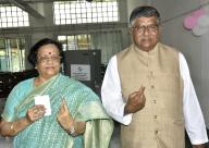 PATNA, INDIA - JUNE 1: BJP candidate from Patna Saheb constituency Ravishankar Prasad with his wife showing finger ink marks after cast vote during seventh and last phase of Lok Sabha election at Patna Women\'s College on June 1, 2024 in Patna, India. (Photo by Santosh Kumar\/Hindustan Times