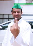 PATNA, INDIA - JUNE 1: RJD leader Tej Pratap Yadav showing finger ink mark after cast vote during seventh and last phase of Lok Sabha election at Bihar Veterinary College on June 1, 2024 in Patna, India. (Photo by Santosh Kumar\/Hindustan Times