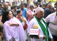 PATNA, INDIA - JUNE 1: RJD Chief Lalu Prasad with his wife Rabri Devi and daughter RJD candidate Rohini Acharya coming out after casting their votes during Lok Sabha election at a polling booth at Bihar Veterinary College on June 1, 2024 in Patna, India. (Photo by Santosh Kumar\/Hindustan Times