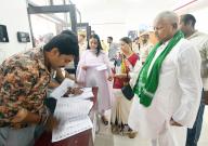 PATNA, INDIA - JUNE 1: RJD Chief Lalu Prasad with his wife Rabri Devi and daughter RJD candidate Rohini Acharya casting their votes during Lok Sabha election at a polling booth at Bihar Veterinary College on June 1, 2024 in Patna, India. (Photo by Santosh Kumar\/Hindustan Times