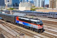 Skyline with a METRA train regional railway at Union Station in Chicago, USA, North