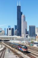 Skyline with METRA train regional train railway local traffic at Union Station in Chicago, USA, North