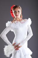 Young woman flamenco dancer studio portrait in white oriental