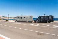 2 mobile homes on the Moll de Llevant promenade, a 4.5 km long promenade for joggers, walkers, cyclists and skaters at the harbour of Tarragona, Spain