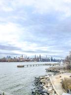 View from Domino Park, Williamsburg, across the East River to the skyline of Manhattan, New York City, USA, North