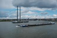 View over the Rhine with two cargo ships, Düsseldorf, Germany