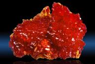 Orpiment, Caucasus, Russia Orpiment is a deep-colored, orange-yellow arsenic sulfide