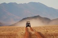 A jeep in the landscape, Namibia