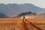 A jeep in the landscape, Namibia