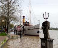 Historic steamship Prinz Heinrich, in front bust of Georg Willms, in the museum harbour, town of Leer, East Frisia, Lower Saxony, Germany