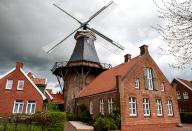 Historic mill and millers house in the fishing village of Ditzum, municipality of Jemgum, district of Leer, Rheiderland, East Frisia, Lower Saxony, Germany