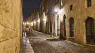 Knights Street, An empty street with historical buildings is illuminated at night, night shot, Rhodes Old Town, Rhodes, Dodecanese, Greek Islands, Greece