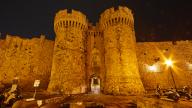 Sea Gate, Thalassini Gate, The majestic city wall of a fortress, illuminated by street lamps at night, Night shot, Rhodes Old Town, Rhodes, Dodecanese, Greek Islands, Greece