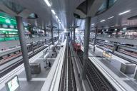 Interior of a modern railway station with several platforms and people travelling, Berlin, Berlin Central Station, Germany
