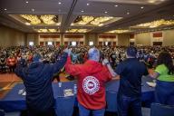 Chicago, Illinois, Shawn Fain (second from left), president of the United Auto Workers union, joins in singing Solidarity Forever at the conclusion of the 2024 Labor Notes conference. That event brought together 4, 700 union activists who are