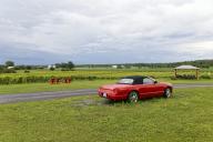 Agriculture, parked red car in vineyard, Province of Quebec, Canada, North