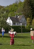 Scarecrows at the parish hall of the Protestant church in Unterburg, Solingen, Bergisches Land, North Rhine