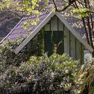 Small garden house with deer antlers in Unterburg, Solingen, Bergisches Land, North Rhine