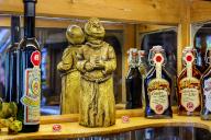 Bottles of beer and monastery liqueur with a little monk, Brauereigasthof, Irseer Klosterbräu, Irsee, Bavaria, Germany