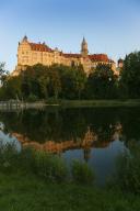 Hohenzollern Castle Sigmaringen, former princely residence and administrative centre of the Princes of Hohenzollern-Sigmaringen, city castle, architecture, historical building, west view, Danube, river, reflection in the water, evening mood, 