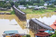 Famous wooden mon bridge in kanchanaburi collapsed during the flash