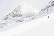 Three ski tourers in the Stuor Reaiddavaggi valley, Kebnekaisefjaell, Norrbotten, Lapland, Sweden, March 2013