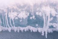 Snow crystals on an ice floe, Abisko National Park, Norrbotten, Lapland, Sweden, December 2012