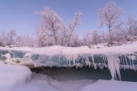 The frozen river Abiskojohkka with the Abisko Alps, Abisko National Park, Norrbotten, Lapland, Sweden, December 2012