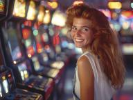 Group of teenagers boys and girls enjoying classic pinball and arcade game machines in a retro arcade saloon, embodying 80s nostalgia and vintage entertainment culture, AI