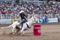 Cowgirl riding fast during barrel racing, Strathmore Heritage Days, Rodeo, Strathmore, Alberta, Canada, North